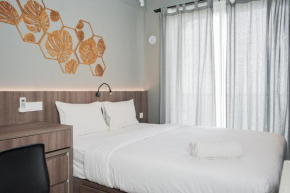 Good Designed and Cozy Studio at Sky House BSD Apartment By Travelio